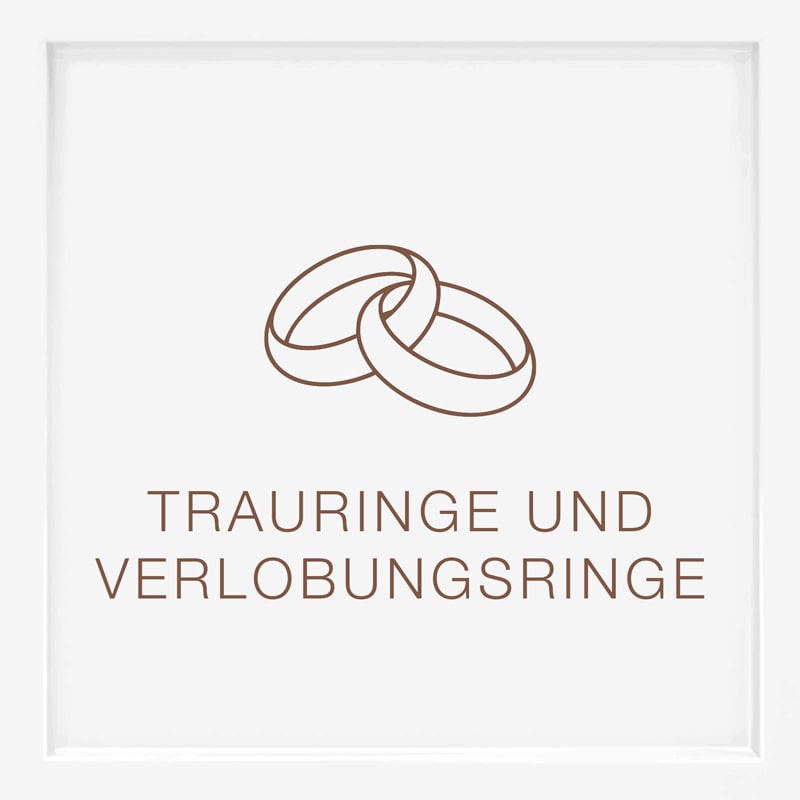 Über den deutschen Worten TRAURINGE UND VERLOBUNGSRINGE" auf weißem Hintergrund sind zwei ineinander greifende Ringe abgebildet, die auf Hochzeits- und Verlobungsringe hinweisen.