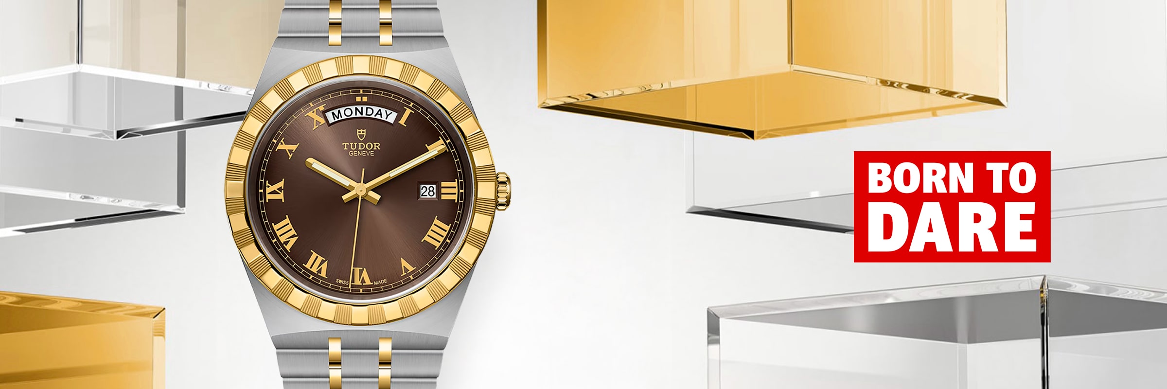 2025 © TUDOR Eine luxuriöse Tudor Royal Uhr mit braunem und goldenem Zifferblatt wird zwischen transparenten und goldenen Würfeln präsentiert. Auf der rechten Seite steht in fetter roter und weißer Schrift "BORN TO DARE".