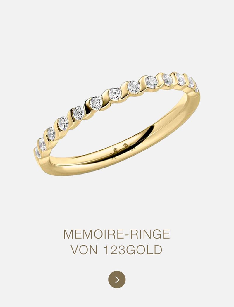 Ein atemberaubender Ring von 123GOLD, der mit funkelnden Diamanten besetzt ist.
